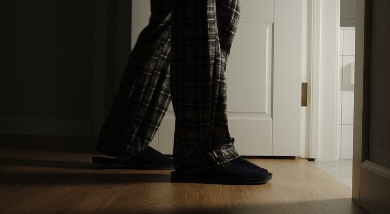 man walking to the bathroom late at night
